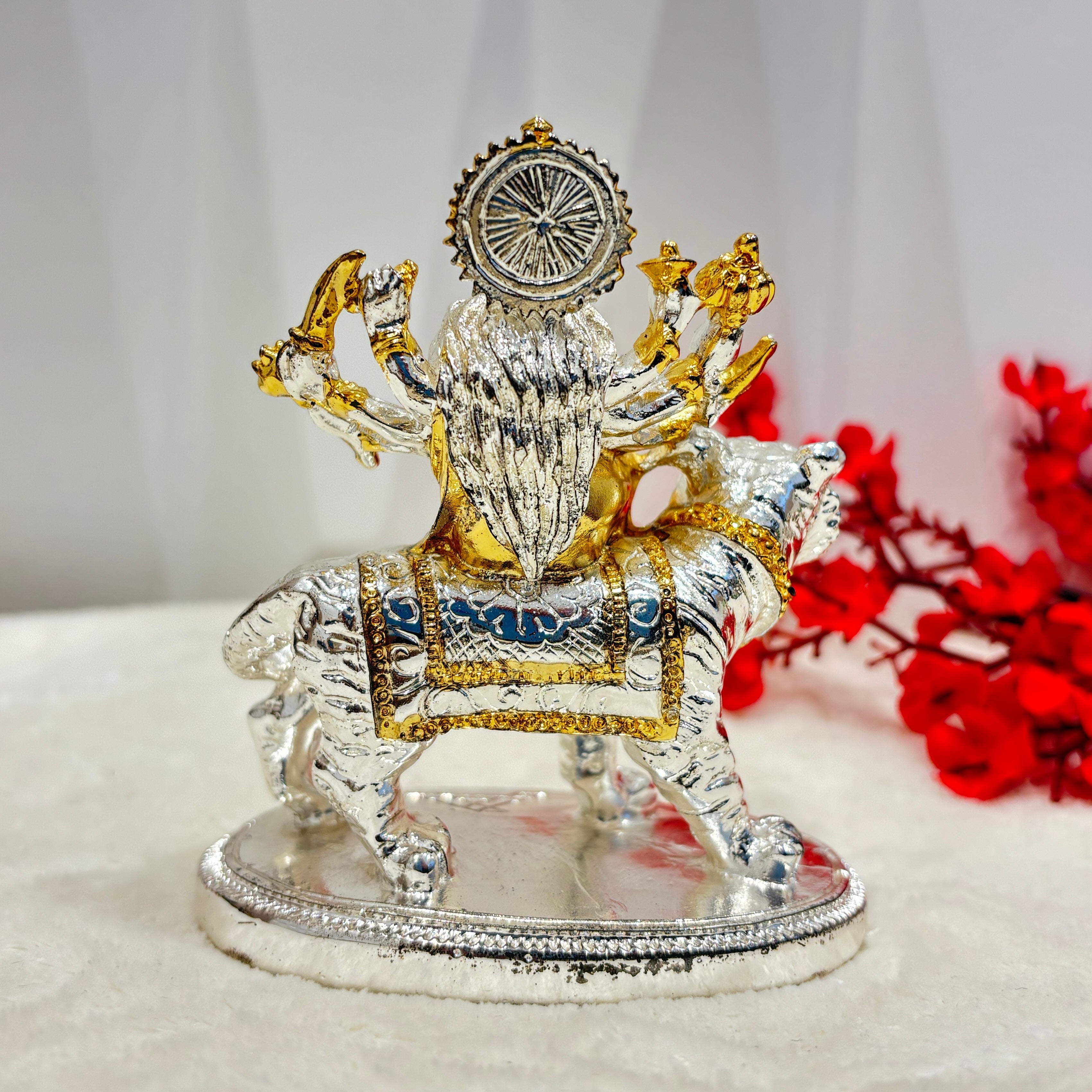 This 999 Gold Coated Durga Mata Idol will bring blessings and prosperity to your home. The intricately designed idol is coated in 999 gold, adding a touch of elegance to your household. Bring home this divine statue and invite good fortune into your life!
